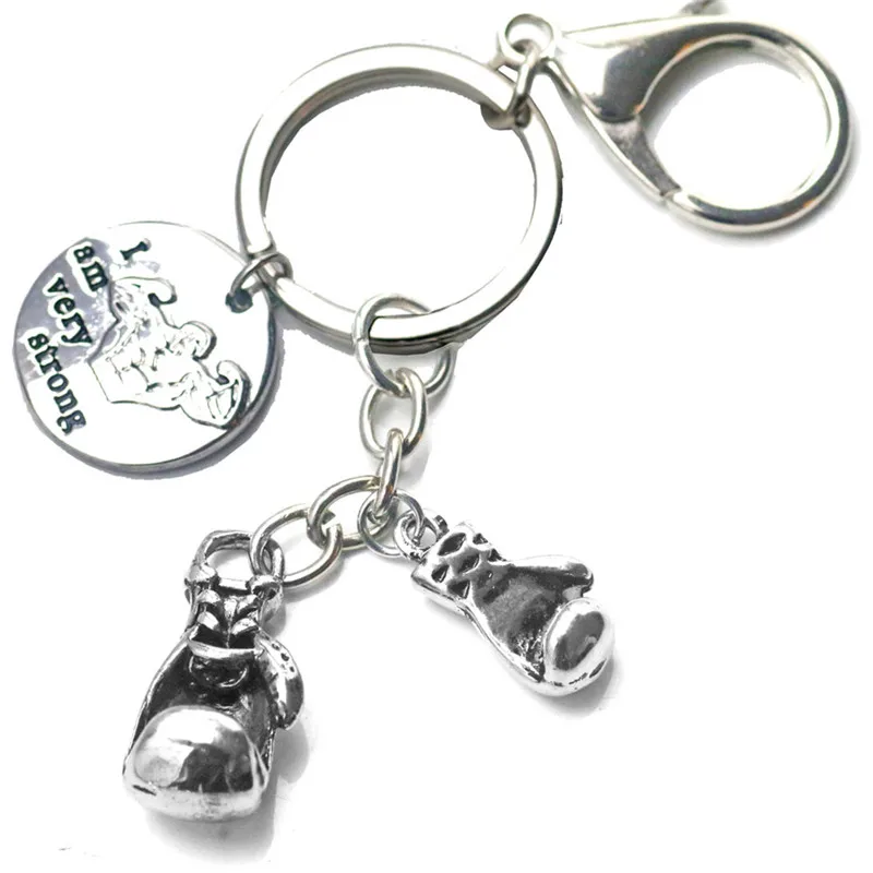 

Boxing Glove Keychain Wallet Fitness Gym I am Very Strong Charms Key Ring Car Purse Bag Buckle Men Sports Hip Hop Jewelry