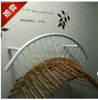 Clothes hangers on display shelf clothing display shelf side wall hanging clothing store shelves display wall hanging
