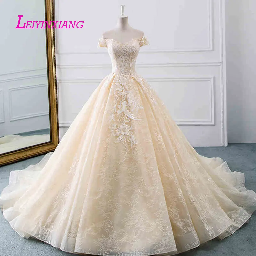 

LEIYINXIANG New Arrival Wedding Dress Vestido De Noiva New Arrival Robe de Mariee Modern Sexy Ball Gown Style Appliques Backless