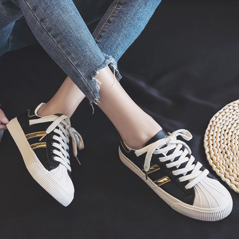 zapatillas negras con blanco para mujer