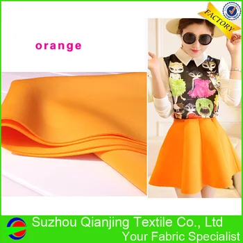 

Orange Yellow Stretch Neoprene Fabric Solid Dyed Weft Knitted Spandex Drapery for Skirt