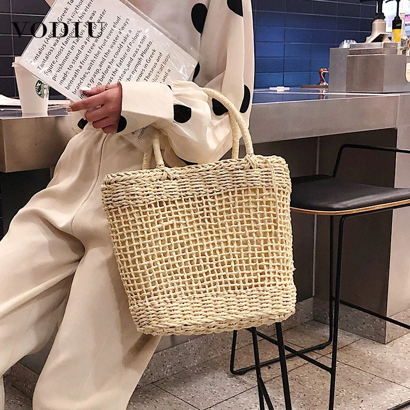 

Women Handbags Sac A Main With The Grass Woven Style Of The Hollow Design Basket Beach Holiday Hand-woven Straw Bag For Female