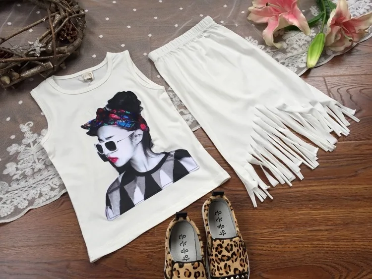 جديد أزياء أطفال بنات ملابس الصيف مجموعة شرابة مجموعة الملابس المطبوعة قميص مع شرابة دعوى للأطفال والصغار