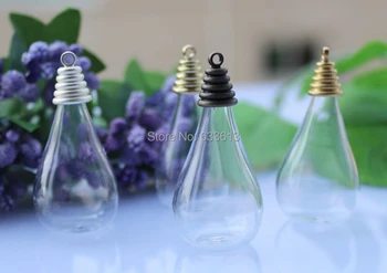 

Free ship!!! ! NEW hot 30pcs/lot 30*18mm drop glass vase cover vials with cap set pendant DIY (glass bottle/Glass vial )