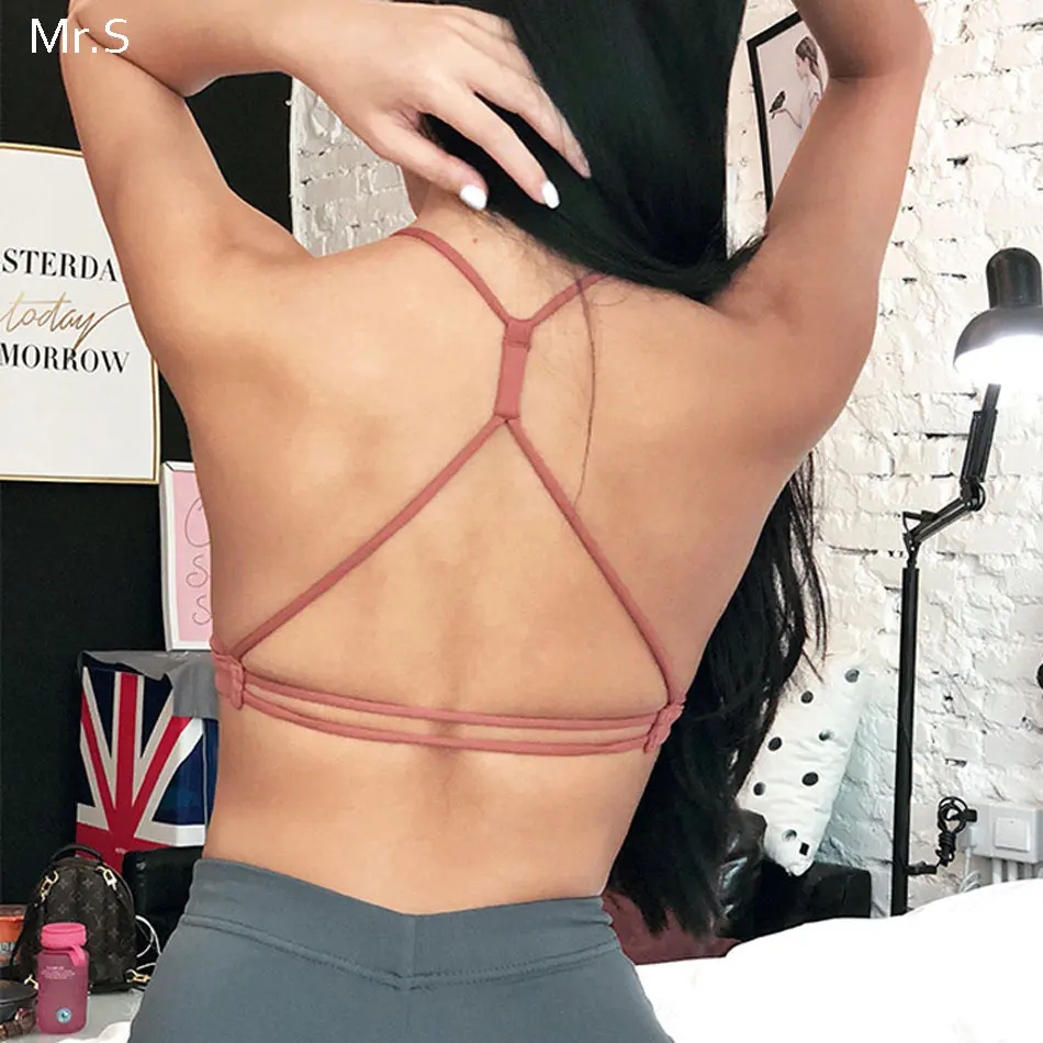 Women's backless strappy sports bra workout wirefree yoga bra sexy deep V gym bra medium support padded sport bra cross yoga top
