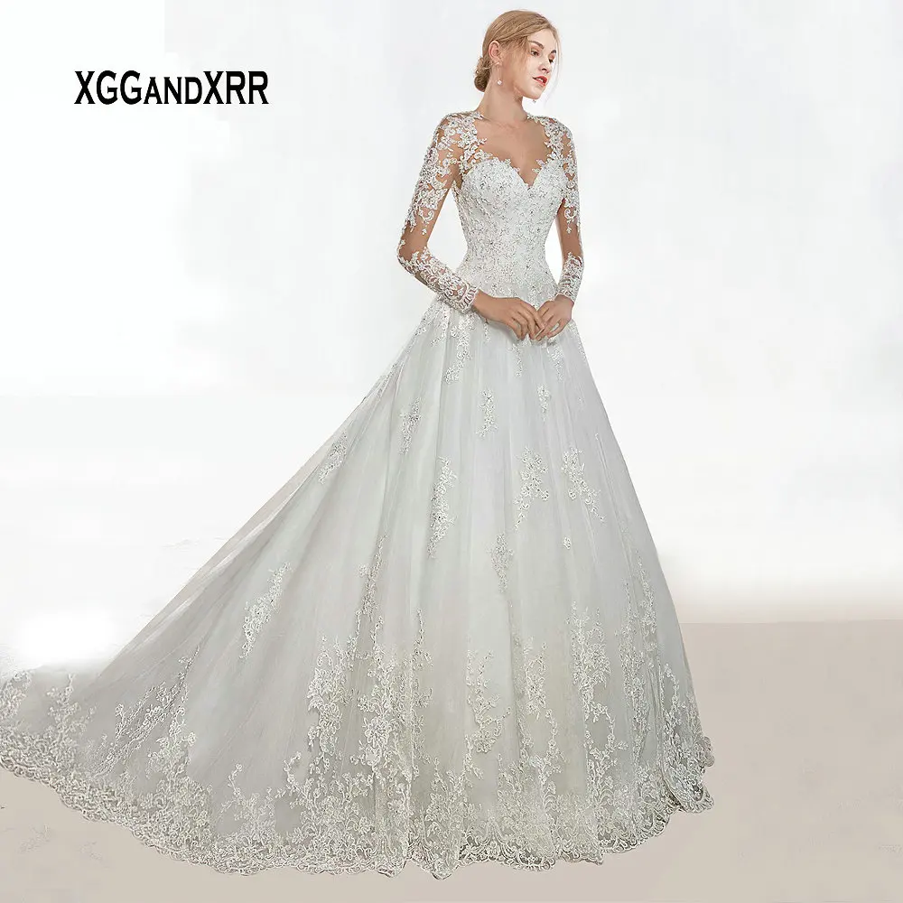 

Luxury O Neck Long Sleeves Illusion Back Long Sleeves Lace Wedding Dress 2019 Bridal Gown Lace Applique Beading Plus Size White