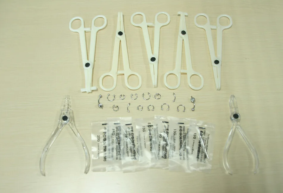 

Disposable Body Piercing Kit Tools Pliers Forceps Needles Accessories Set with Eyebrow Labret Lip Nipple Nose Studs Rings