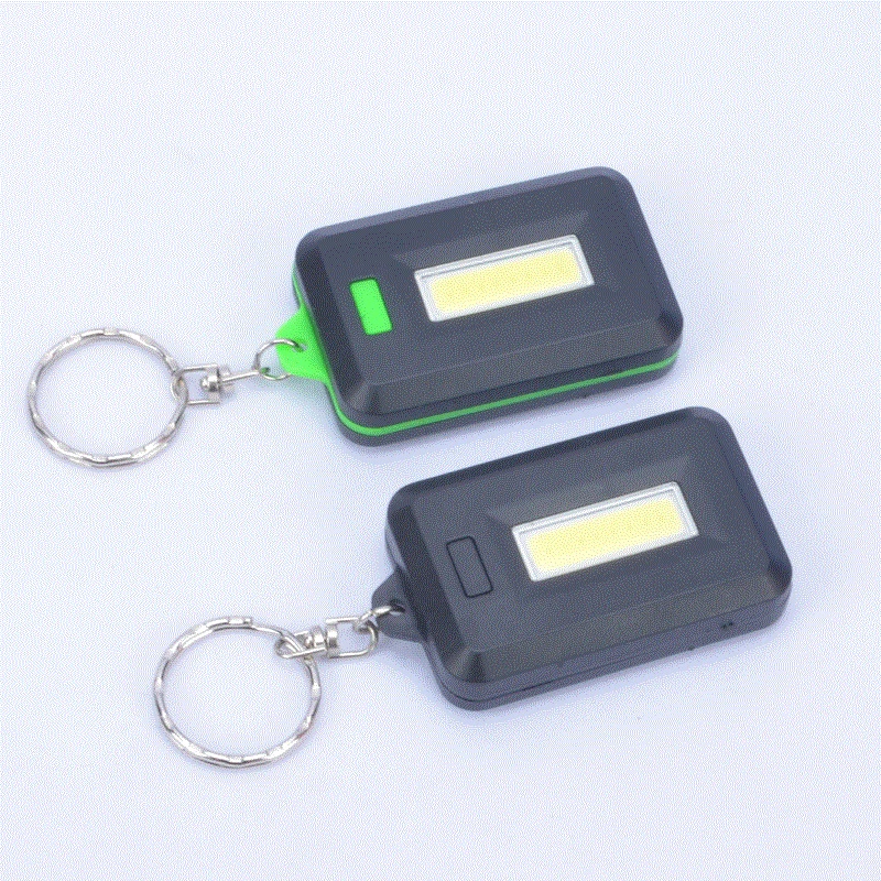 

Mini COB LED Keychain Flashlight Tactical 3 Mode PVC Key Chain Pocket Lantern Torch Emergency Flash Light Use 3*AAA Battery