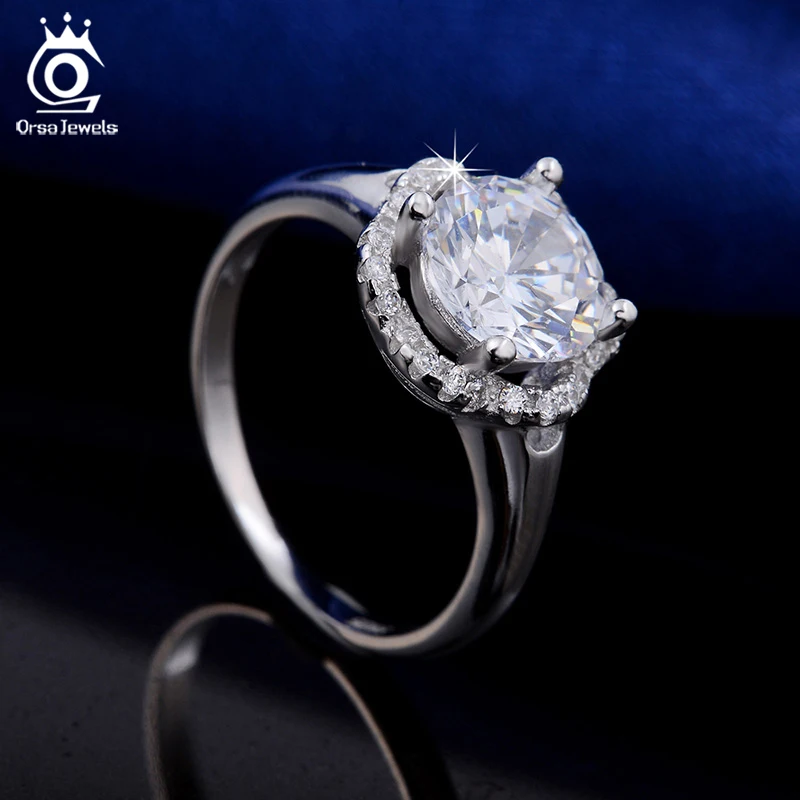 ORSA JEWELS Fashion Jewelry Flower Wedding Ring for Women Engagement Rings with One Big Luxury 2 Carat AAA Cubic Zirconia OR34
