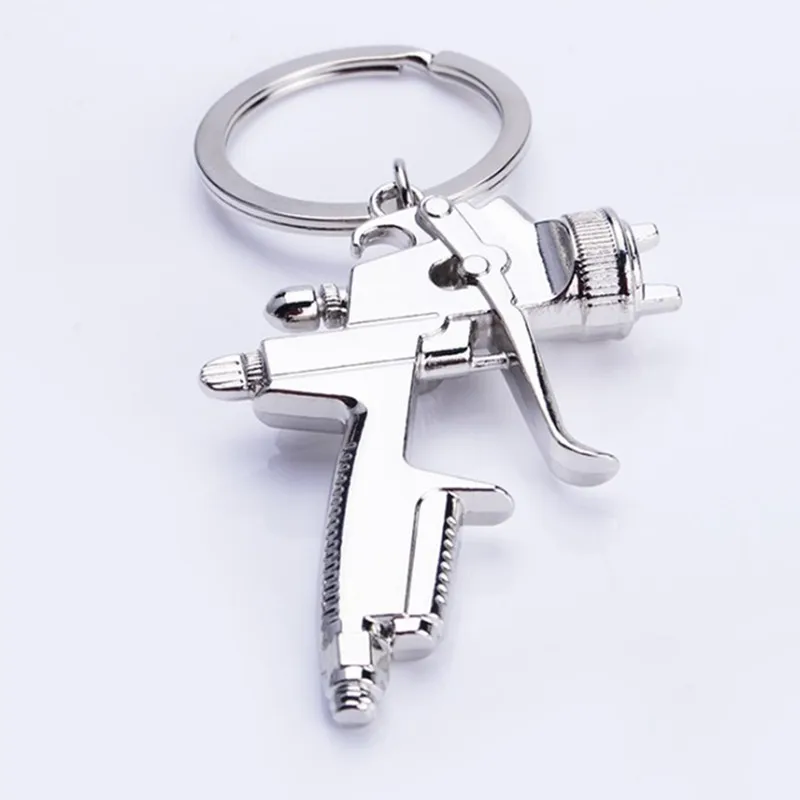 Water Spray Gun Keychain Metal Men Gift Car Key Chain Motorcycle Auto Accessories Creative Key Ring Water gun Key Cover Holder