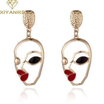 

XIYANIKE 2017 New Hot Fashion Design Alloy Pearl Crystal Eyes Hollow Face Earrings For Women Party Jewelry Bijoux Femme E1354