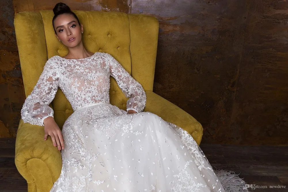 crystal-design-2019-wedding-dresses-with-feather-a-line-backless-bateau-sheer-neck-bridal-gowns-court-train-sleeveless-wedding-dress (1)