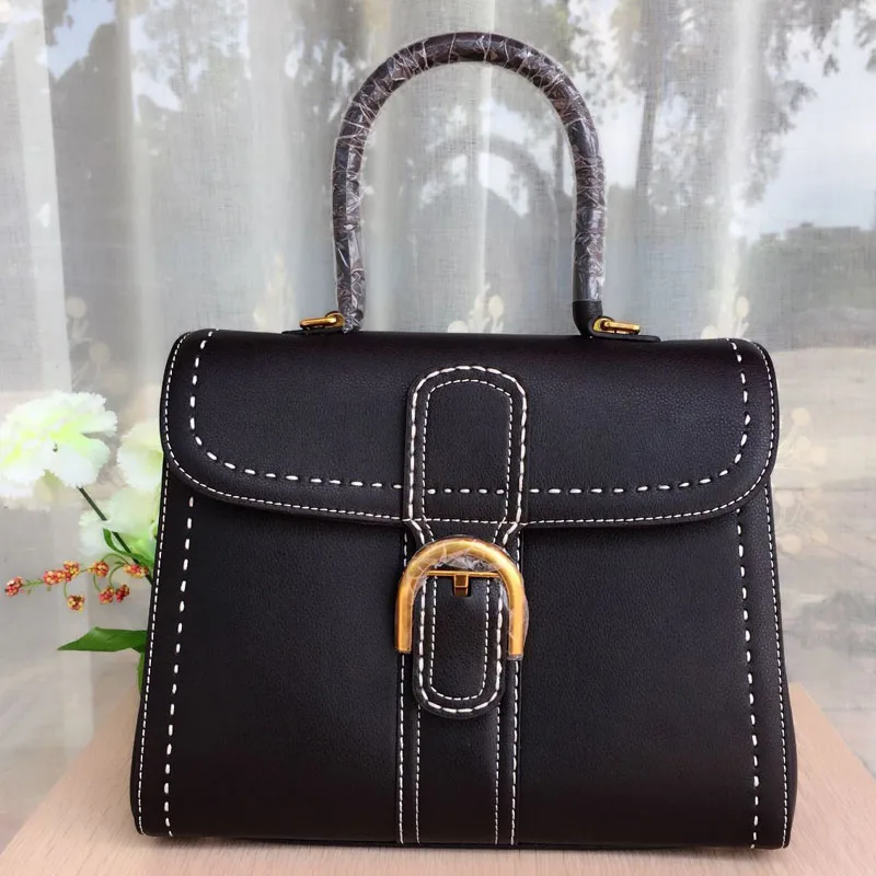 Simple and fresh women leather handbags fashion star with the cover of the outer seam white line horseshoe buckle women bag