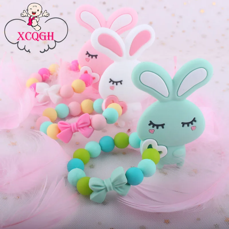 

XCQGH Baby Silicone Teether Cute Cartoon Rabbit Shape Molars Silicone Bracelet Baby Molar Bite Teether Baby Toys Teether