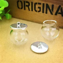 100sets/lot 20mmx15mm clear empty glass globe bottle with silver base cap set glass vial pendant glass dome cover цена 100sets/lot 20mmx15mm clear empty glass globe bottle with silver base cap set glass vial pendant glass dome cover цены онлайн