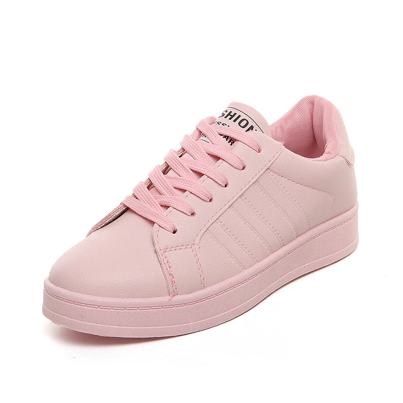 pink and white tennis shoes