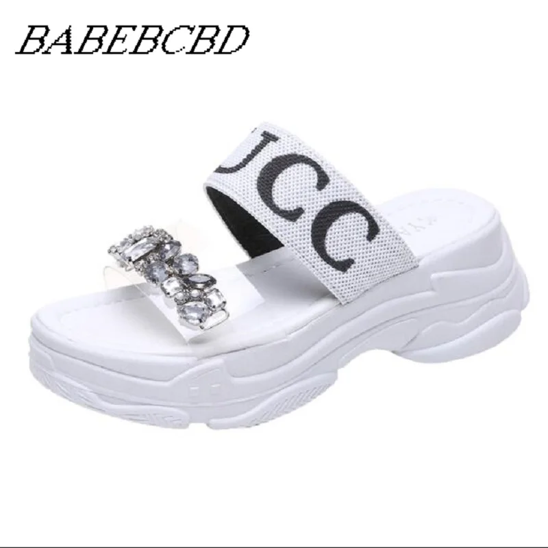 

Slipper lady outside wearing 2019 new summer fashion transparent loafers with high heels and women platform slippers