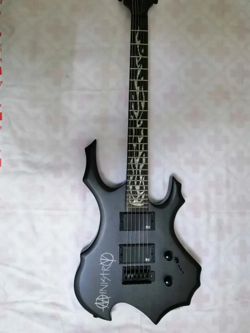 

Shaped electric guitar, color optional, free shipping, can be customized