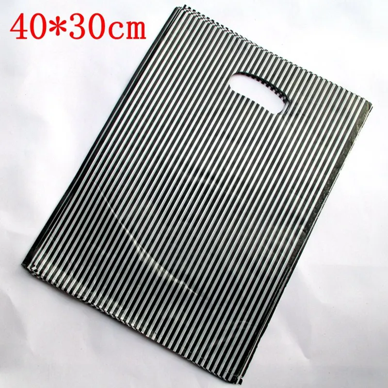 

100 PCS/lot 30 * 40 cm Vertical stripes blossom put the design quite plastic jewelry bags 009001011