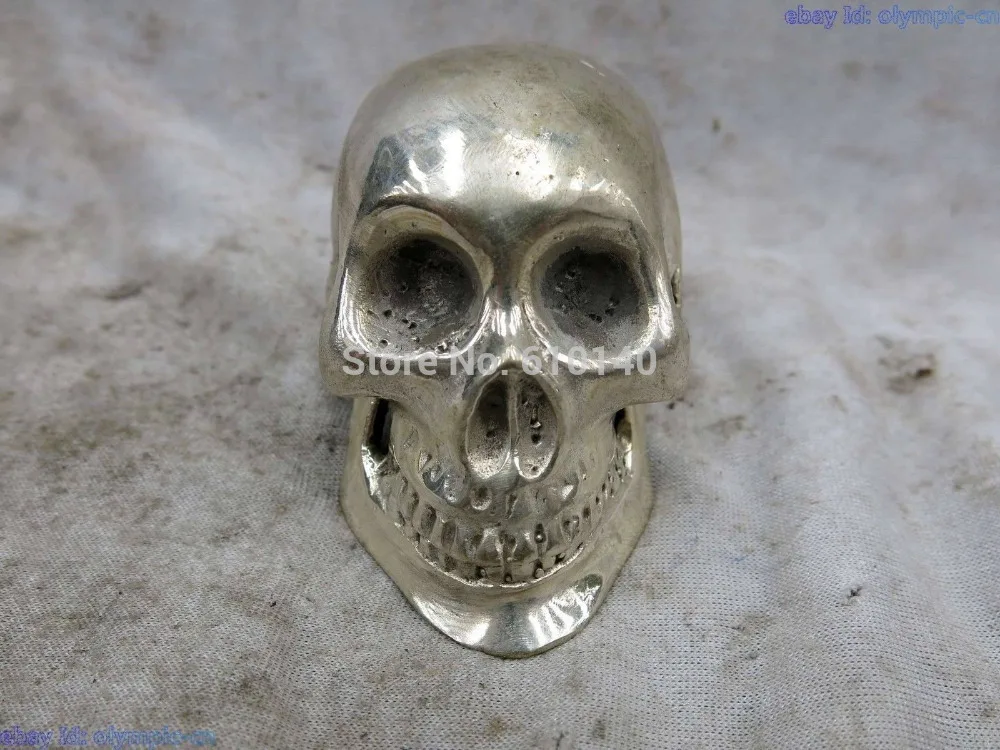 

China silver carved beautiful finely lucky death's head statue