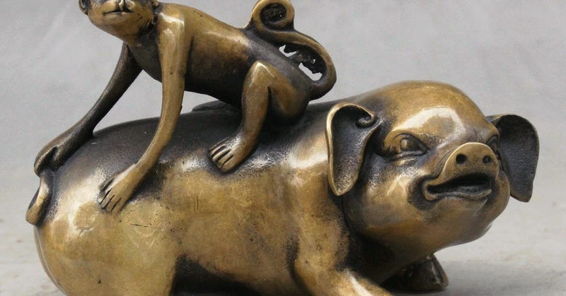 

Folk China FengShui Pure Bronze Auspicious Zodiac Monkey Ride Pig Hog Statue