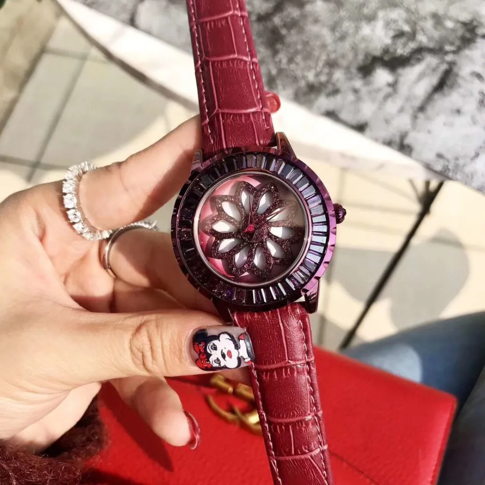 

Delicate Lovely Daisy Flower Spinning Watches for Women Pretty Noble Purple Crystals Watch GOOD LUCK Rotating Quartz Wrist watch