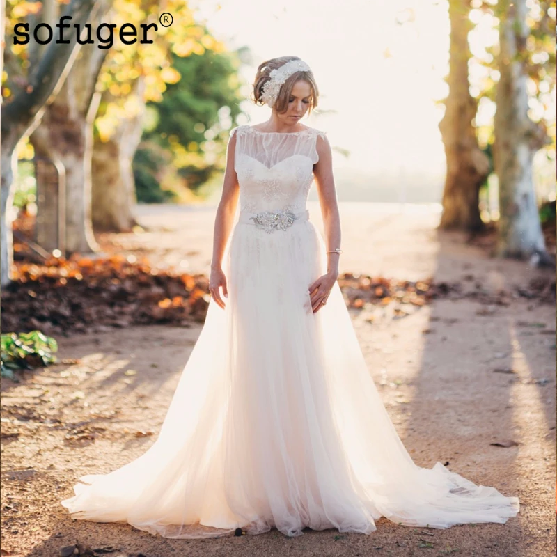 

White A Line Boat Neckline Tulle Backless Sash Beadings Elegant Appliques Wedding Dresses Robe De Mariage 2019 Custom Made