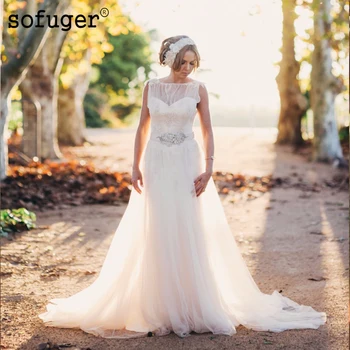

White A Line Boat Neckline Tulle Backless Sash Beadings Elegant Appliques Wedding Dresses Robe De Mariage 2019 Custom Made
