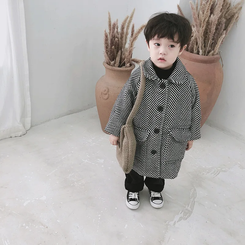 

Children's woolen coat 2018 autumn and winter new boys and girls plus velvet thickening long Korean version of the woolen coat