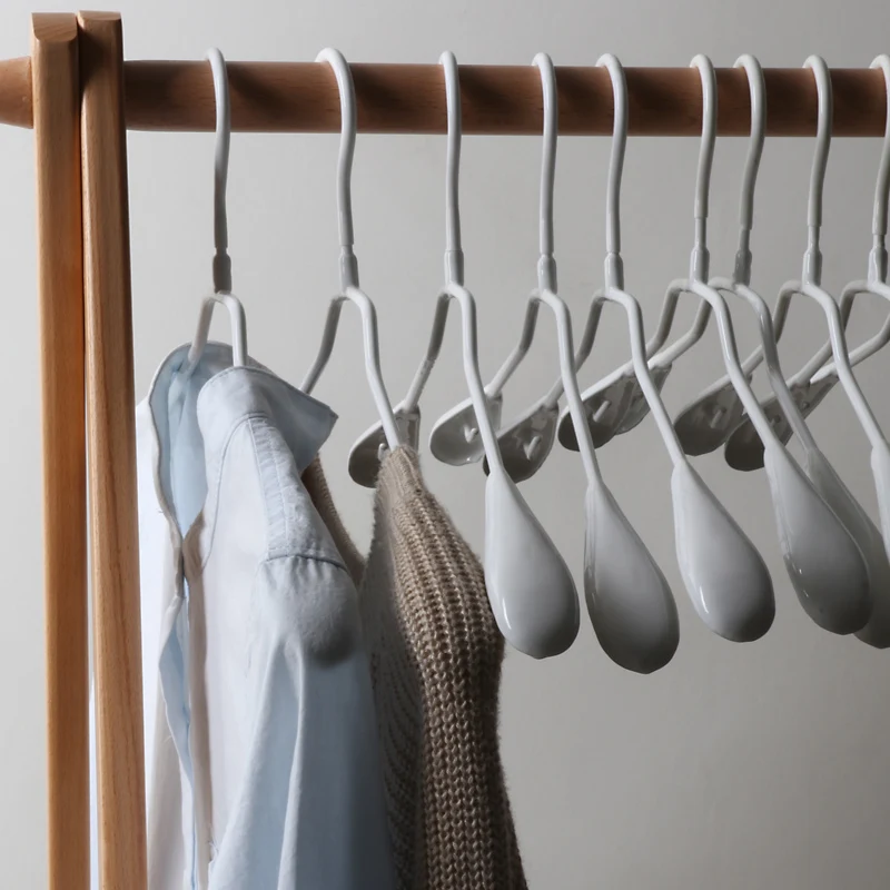 

White Korean Creative Boutique Anti-skid Clothes Rack Plastic Coated Metal Coat Drying Rack Black White Seamless Suit Hangers