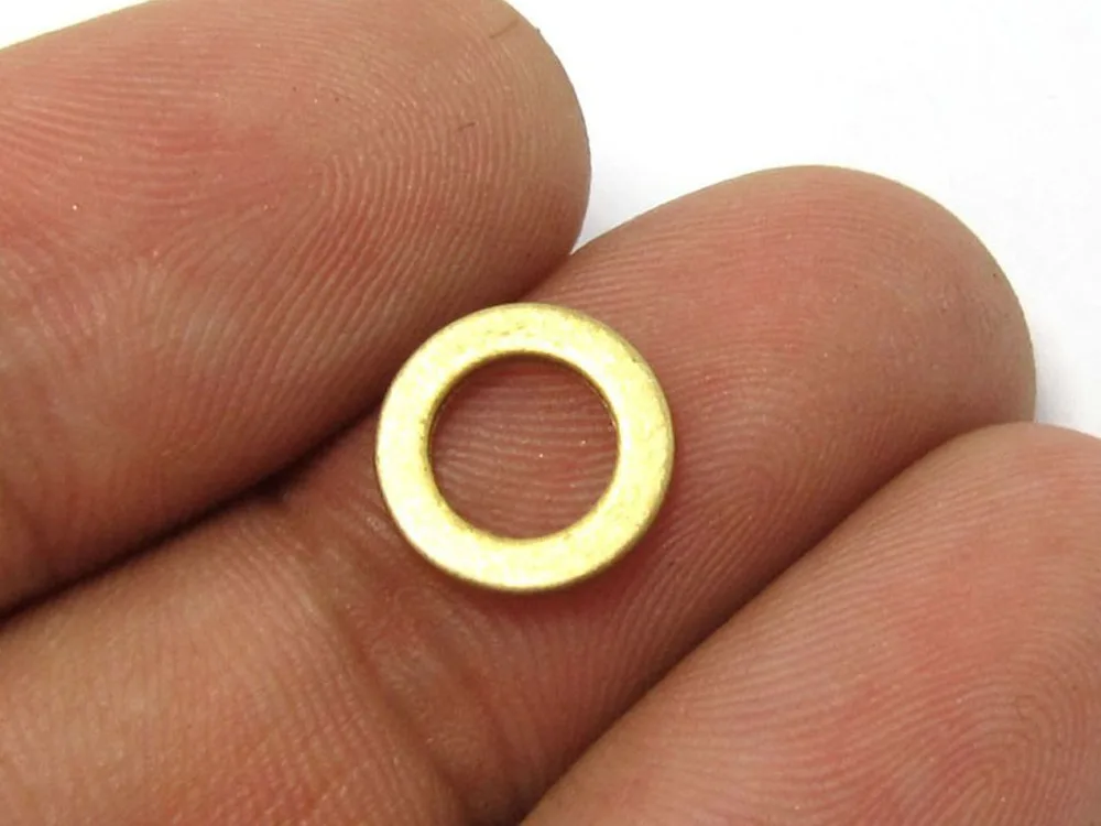 

Raw brass thick circle 10x2x1mm Raw brass findings R150