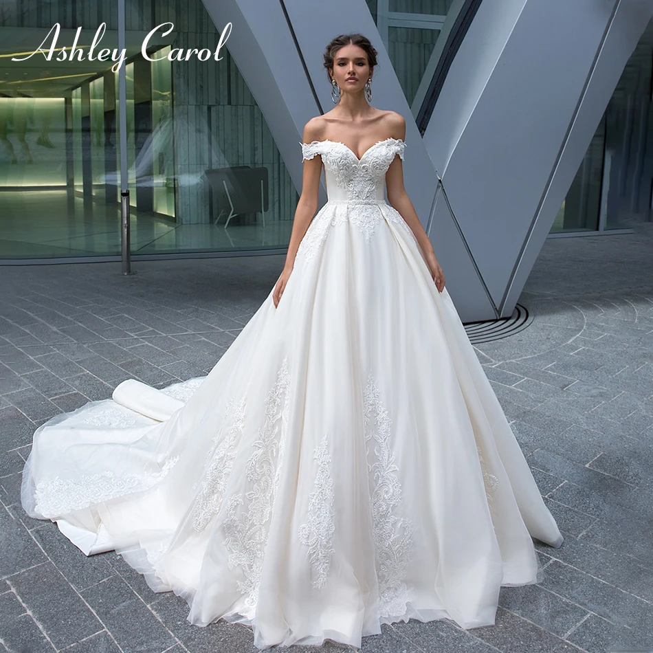 

Ashley Carol Sexy Sweetheart Cap Sleeve Backless Wedding Dress 2019 New Luxury Beaded Sashes Court Train Princess Wedding Gowns