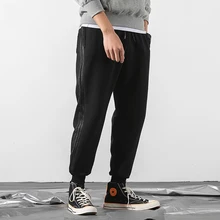 Europe and the United States 2019 new men's casual wild print men's sports pants running fitness breathable pants tights