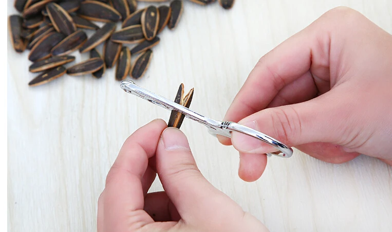 Quick Easy Stainless Steel Melon Seed Plier Sunflower Seed Nut Opener Home Tool
