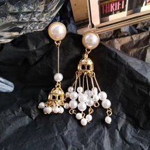 Модные жемчужные серьги в ретро-стиле, Асимметричные Длинные женские серьги, темперамент, плавление жемчуга, кисточки, необычные серьги для женщин