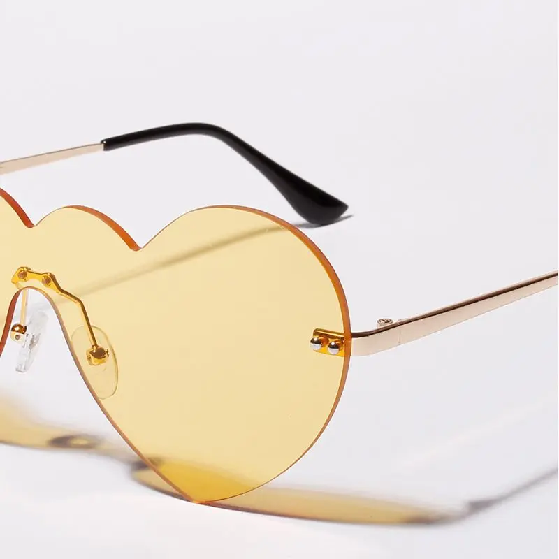 Heart Shape Lens Sunglasses Rimless Metal Personality UV400 One-piece Sun Glasses Charms Fashion Unisex Party Women Eyewear Gift