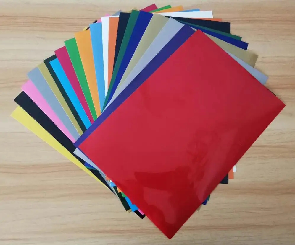 Tanie Darmowa wysyłka 20 arkuszy kolory A4 PVC folia winylowa do przenoszenia za pomocą ciepła żelazko na winylu prasa ciepła ploter tnący HTV T shirt DIY