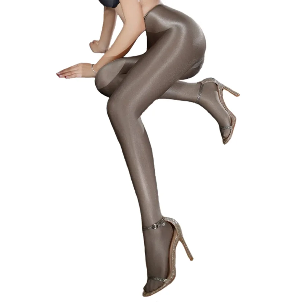 

Women Sexy Shiny Pantyhose Shining Glossy Oil Dance Tights With Cotton Pad Temptation Hosiery 70D Medias