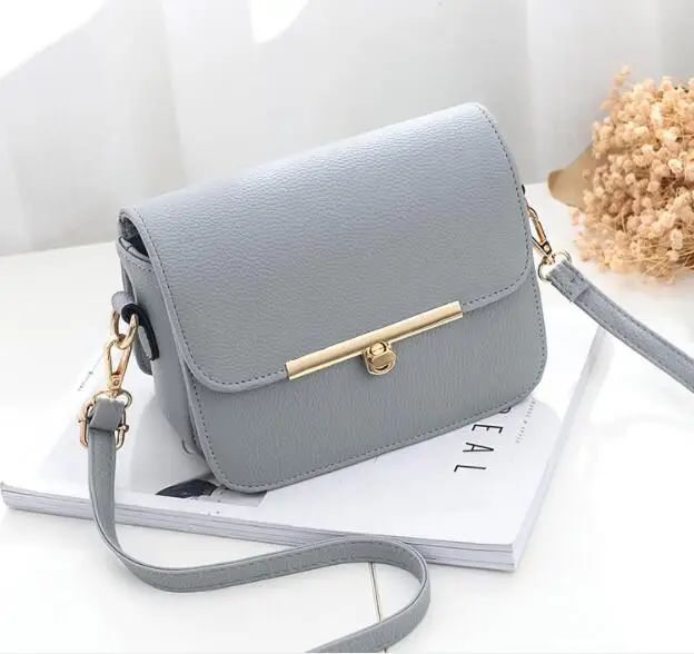 

2018 free shipping new New fashion spray Narcissus, square bag,New PU lock flip single shoulder bag, sloping women's bag.