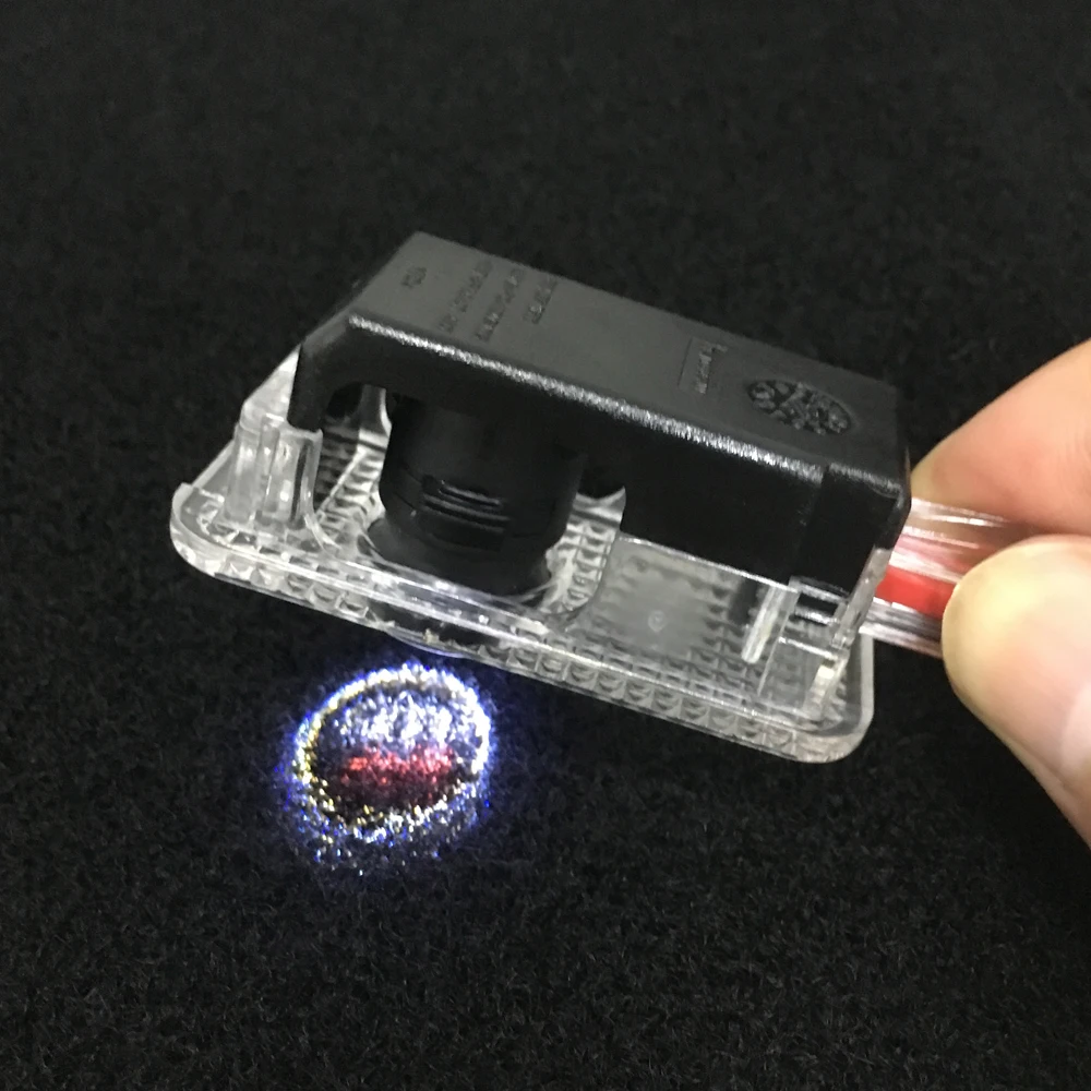 

for AUDI A6 C6 C7 A3 A7 A4 B5 B6 B7 B8 A5 C5 A8 Q3 Q5 Q7 A1 V8 8V 8L 8P R8 RS 2pcs LED Courtesy Light Car Door Audi Logo Light