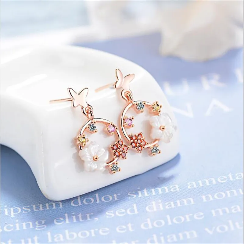 

LULU-PIG 925 sterling silver butterfly flower earrings Korean web celebrity sen long shell small fresh girl earrings ED717