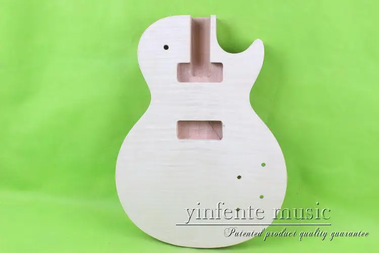 

Один 23 # необработанный корпус электрогитары из красного дерева и топ из клена P90