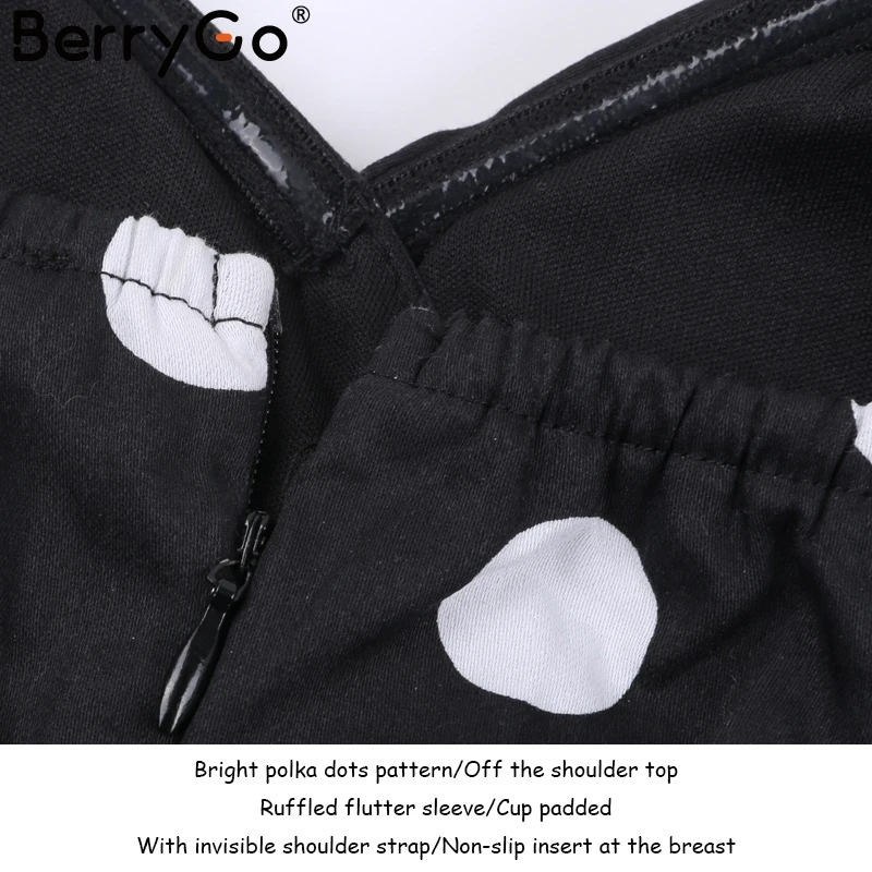 Женская блузка в горошек BerryGo черная с открытыми плечами и рюшами рукавом