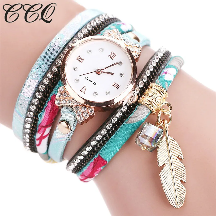 

2017 New CCQ Fashion Brand Clock Quartz Watch Women Dress Leather Wristwatches Casual Pendant Bracelet Clock Watches C51