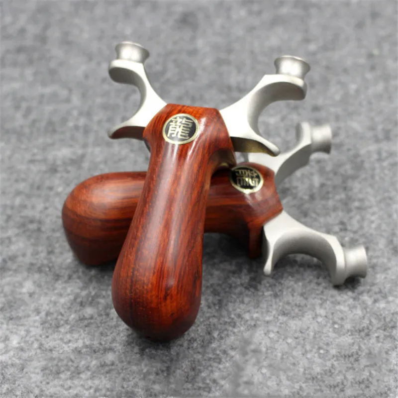 

Hunting Slingshot Stainless Steel Catapult + Wood Handle Outdoor Precise Shooting with Flat Rubber Band 2019 New