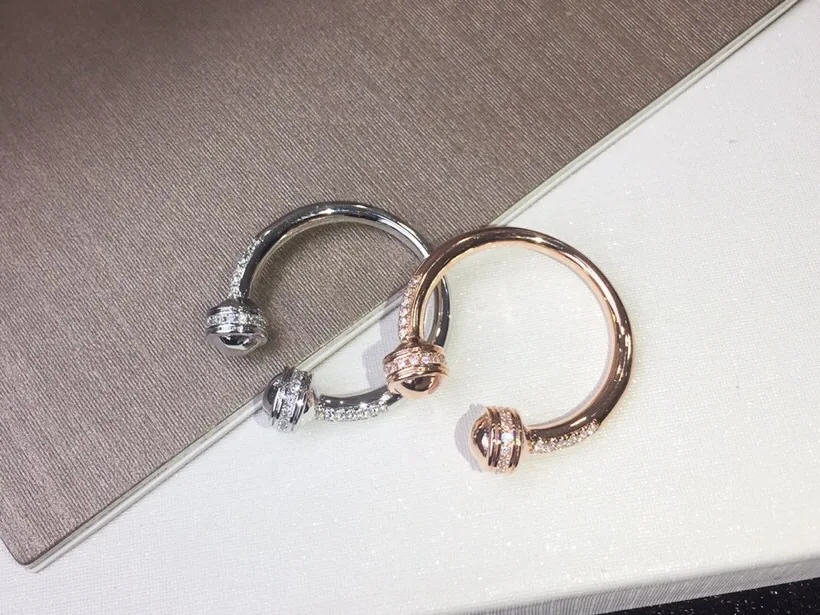 

Hot famous brand party jewerly rotate ring rose gold silver gold spin round two ball ring can be move rotating finger jewelry