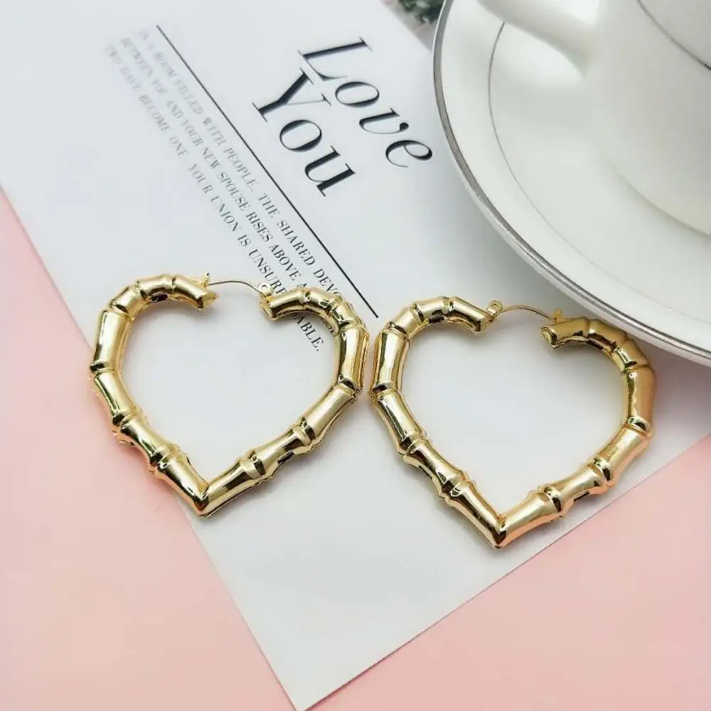

TRENDY WOMEN EARRINGS GOLD COLOR PLATING GOOD QUALITY HEART SHAPED HOOP EARRINGS
