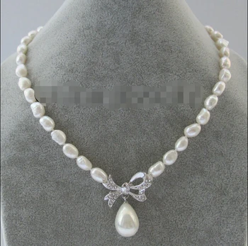 

FREE shipping>>> >>> 17 " 9-12mm white baroque freshwater pearl necklace + butterfly 20mm shell pearl 6.07 6.08