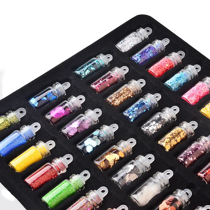 Kit de dijes de Arte de uñas con decoración de diamantes de imitación de 48 botellas que contienen arte de uñas al azar con lentejuelas y brillo de uñas en polvo conjunto