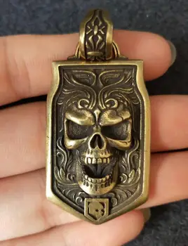 

Chinese pure brass carving Skull head small pendant
